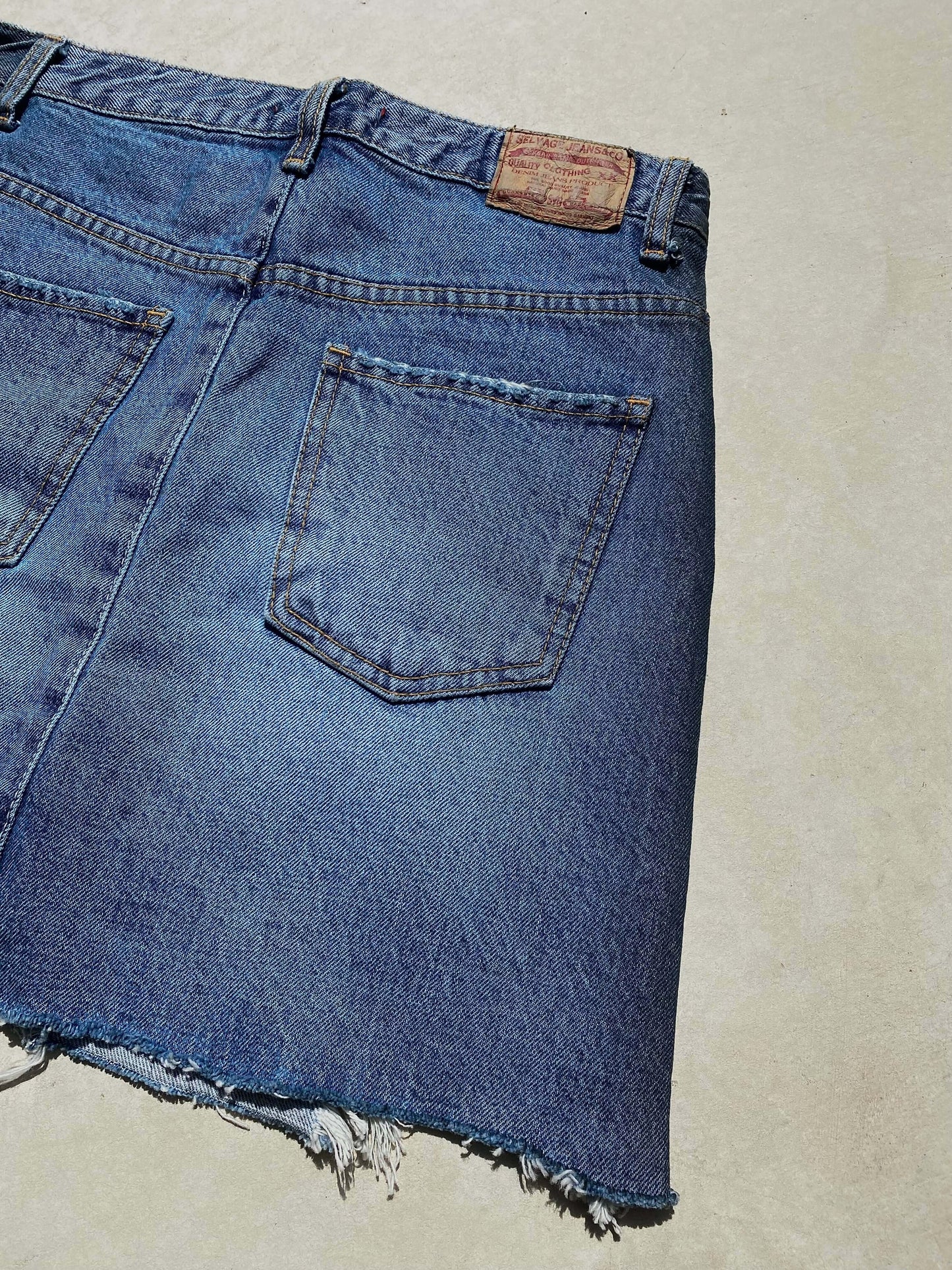 DAMAGE DENIM MINI SKIRT