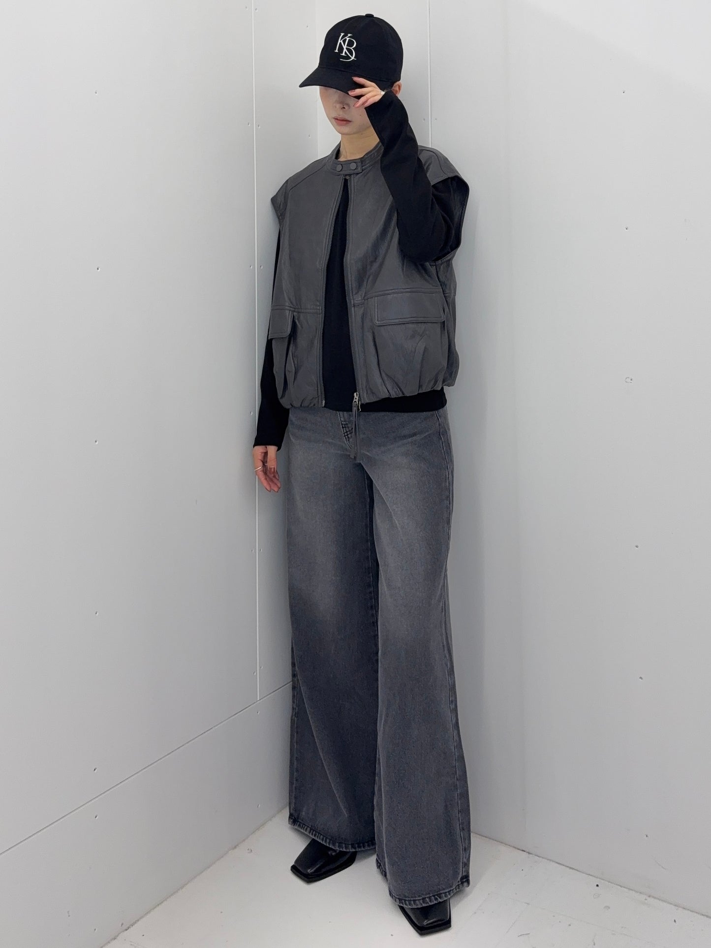 Collarless leather vest