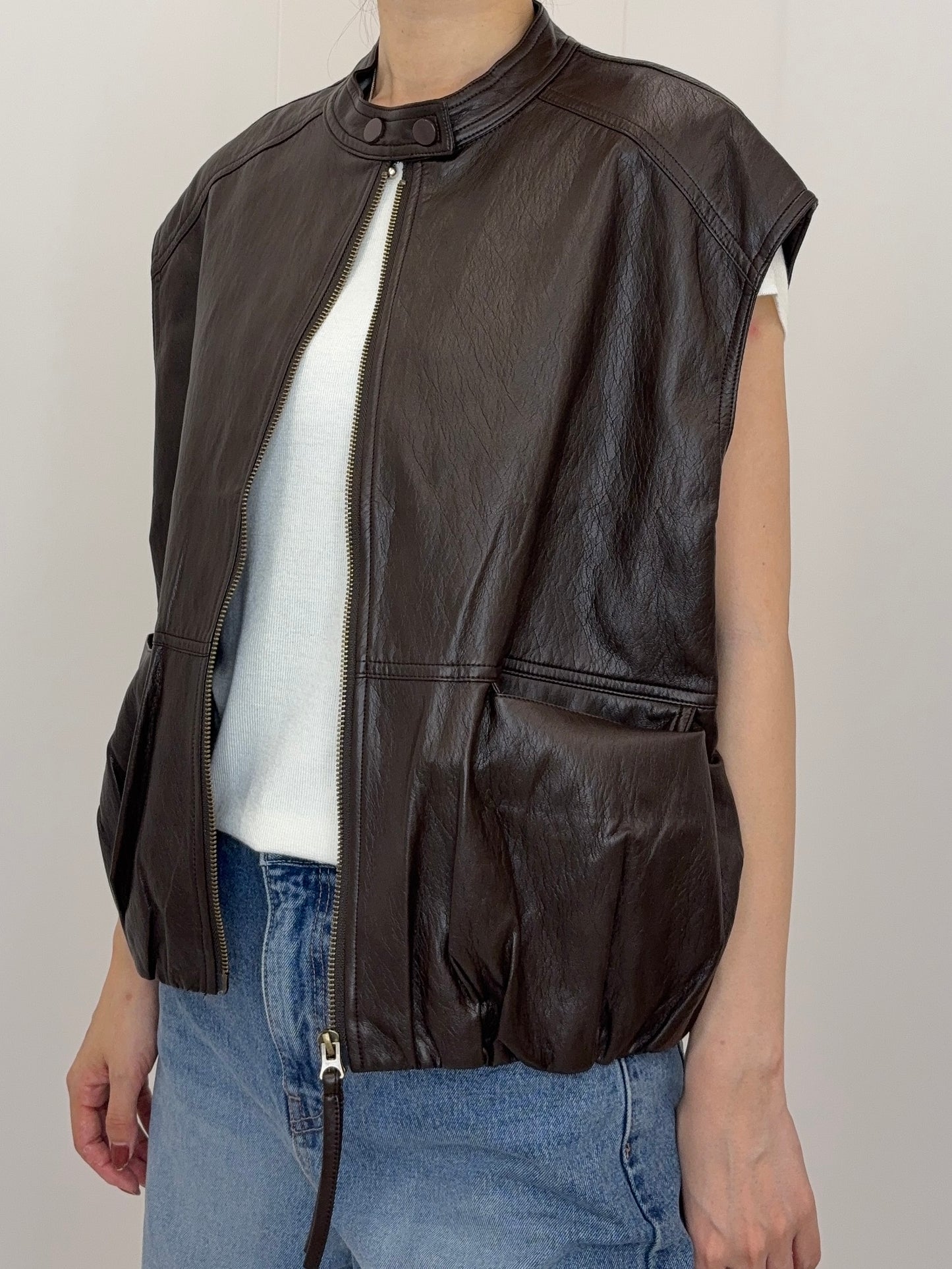 Collarless leather vest