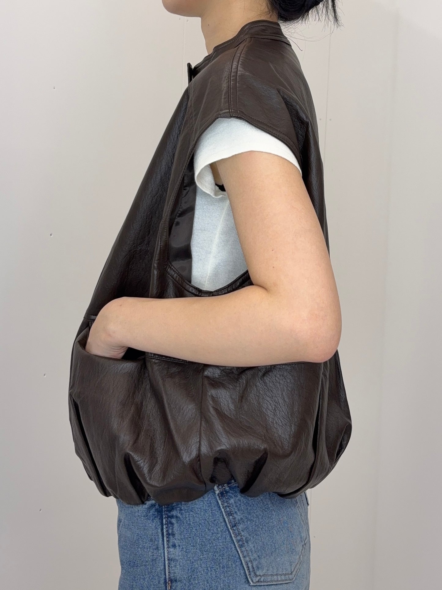Collarless leather vest