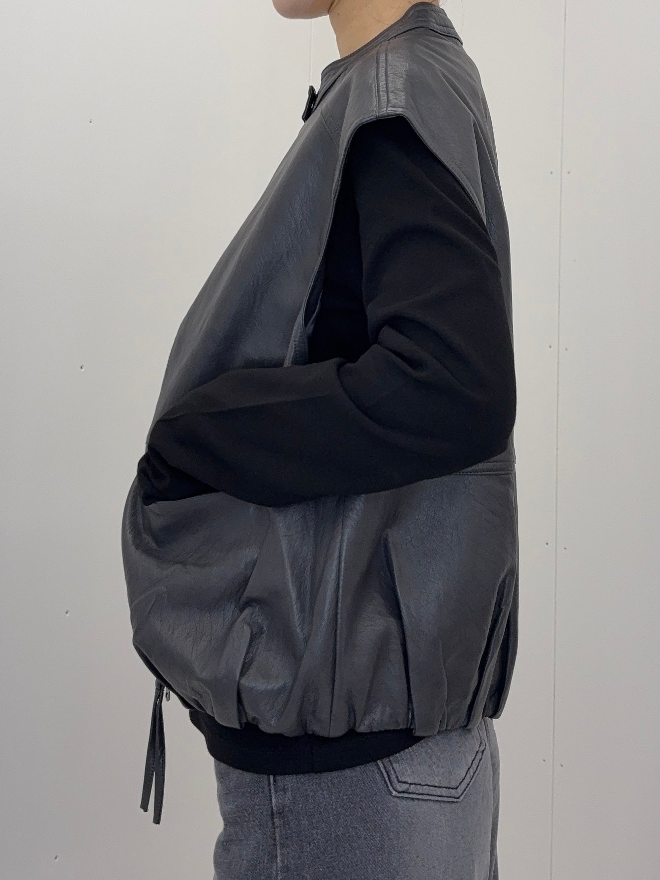 Collarless leather vest