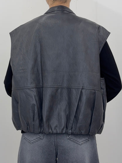 Collarless leather vest