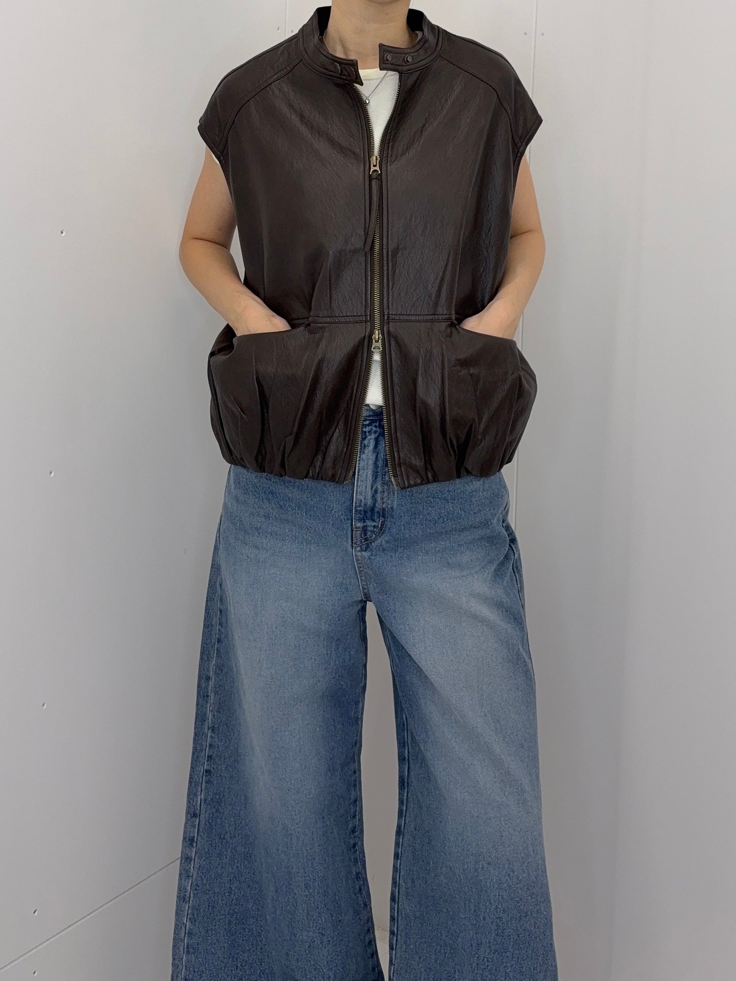 Collarless leather vest
