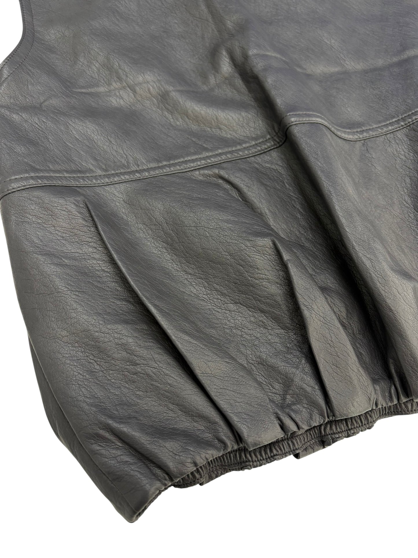 Collarless leather vest